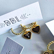 Load image into Gallery viewer, ••coming soon•• DOUBLE SIDED HEART CHARM HOOPS by : DBL
